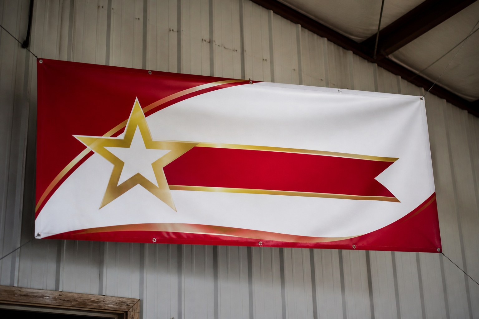 Hanging vinyl banner with grommets on a shop wall